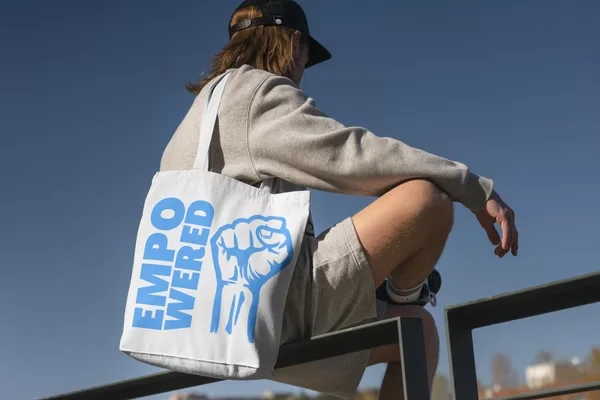 Empowered event tote bag designed by Surge for AJEC Youth